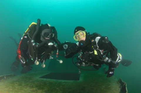 Mixed OC & CCR dive team. Photo by Michael Rothschild