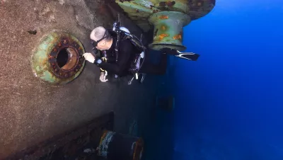 Diver at porthole on The Wit.